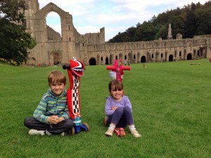 Alex and Emily with scooters at Fountain Abbey